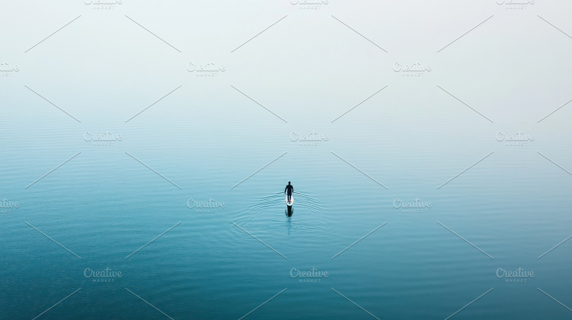 Solitude on calm waters at dawn, a Photo by Beautiful things