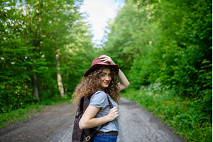 Young tourist woman traveller with, a Person Photo by HalfPoint