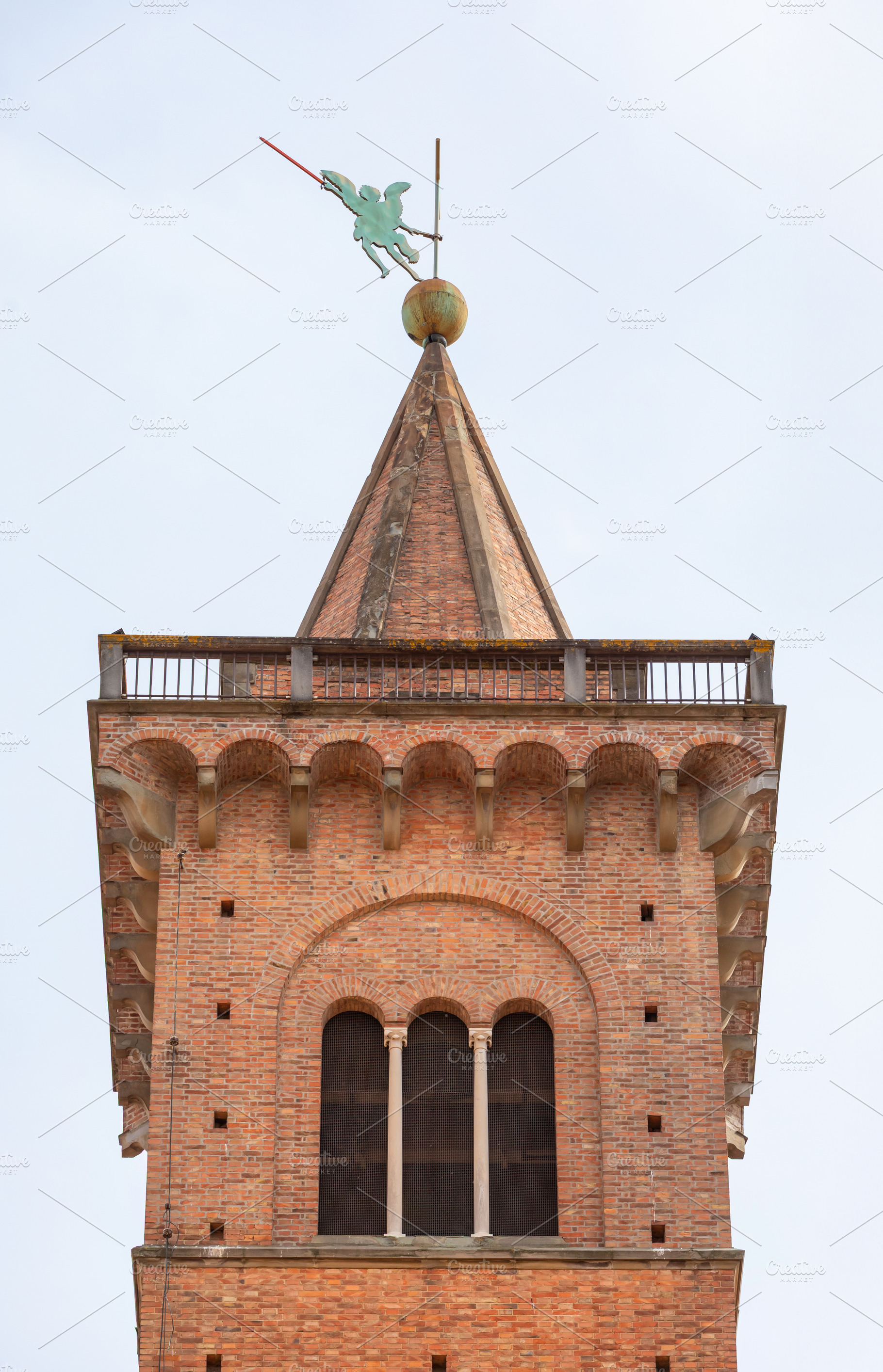 The top of the Collegiate Church of Sant'Andrea in Empoli showing the weather v, a Photo by Antonio Gravante Market