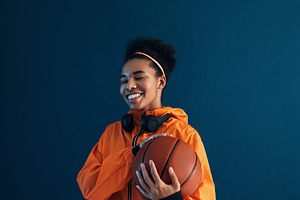 Happy sportswoman with closed eyes, a Sports & Recreation Photo by Artem Varnitsin