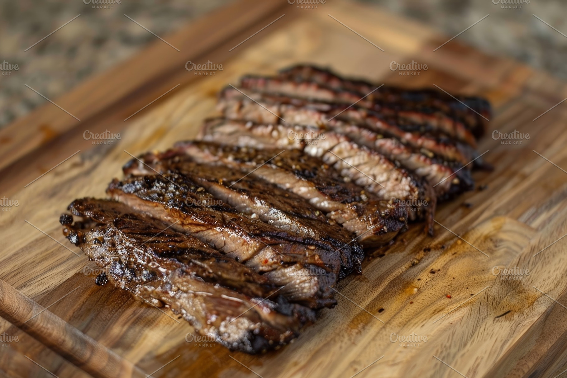 Marinated flank steak resting on a w, a Photo by Iftikhar Alam