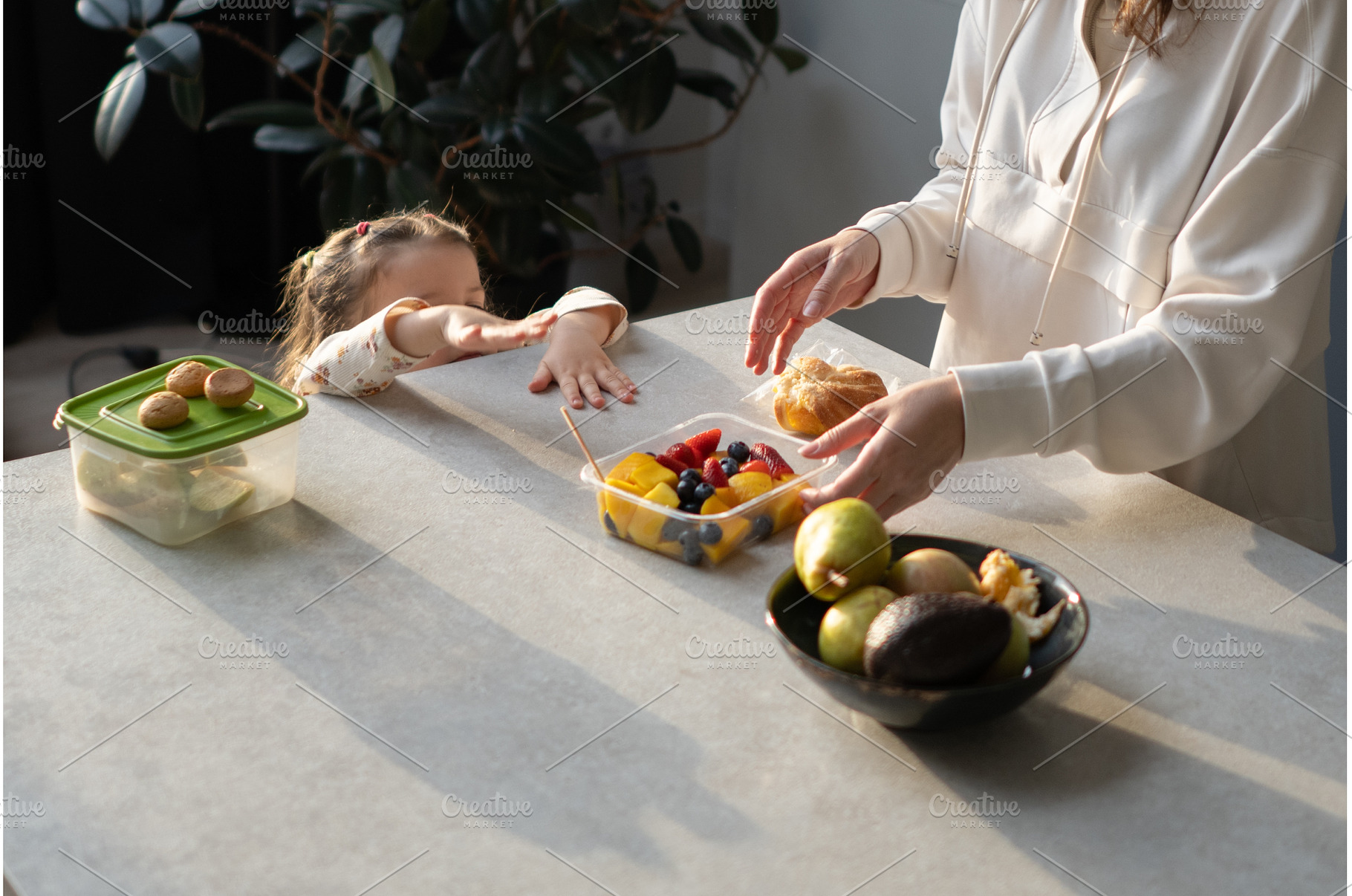 Girl at home reaching toward, a Food & Drink Photo by undrey