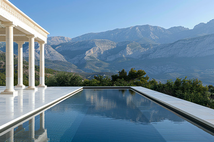 Nestled in the mountains, a pristine, a Photo by Tanuart
