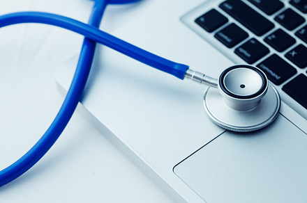 Stethoscope on laptop  computer repair and maintenance concept  in dark tone, a Technology Photo by Twinster Photo