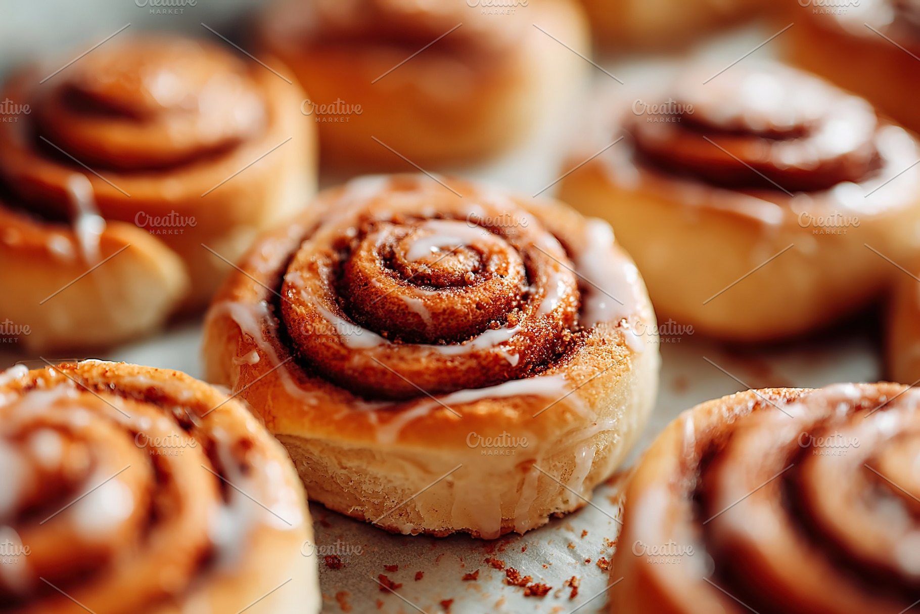 Vegan cinnamon rolls topped with creamy cashew glaze ready for enjoyment, a Food & Drink Photo by AlyaAnd