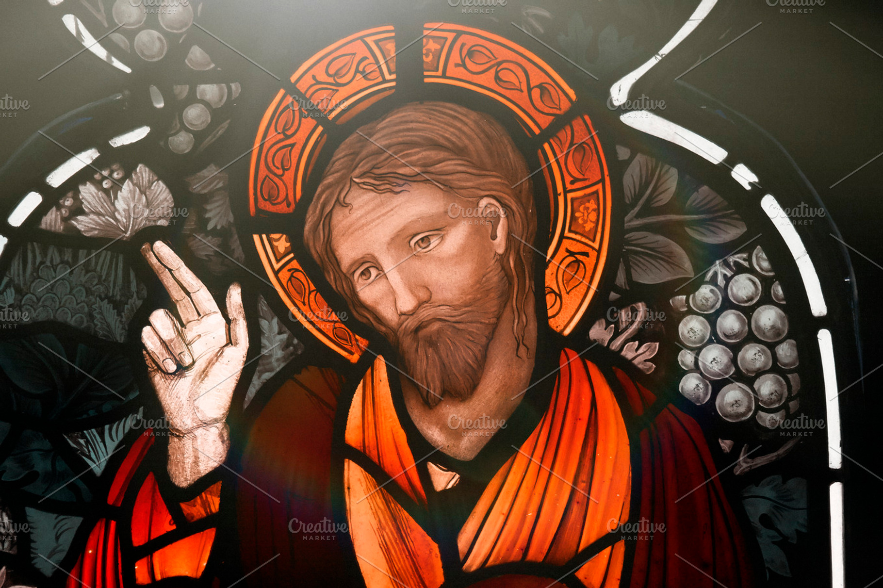 Stained glass window containing jesus, church, and faith