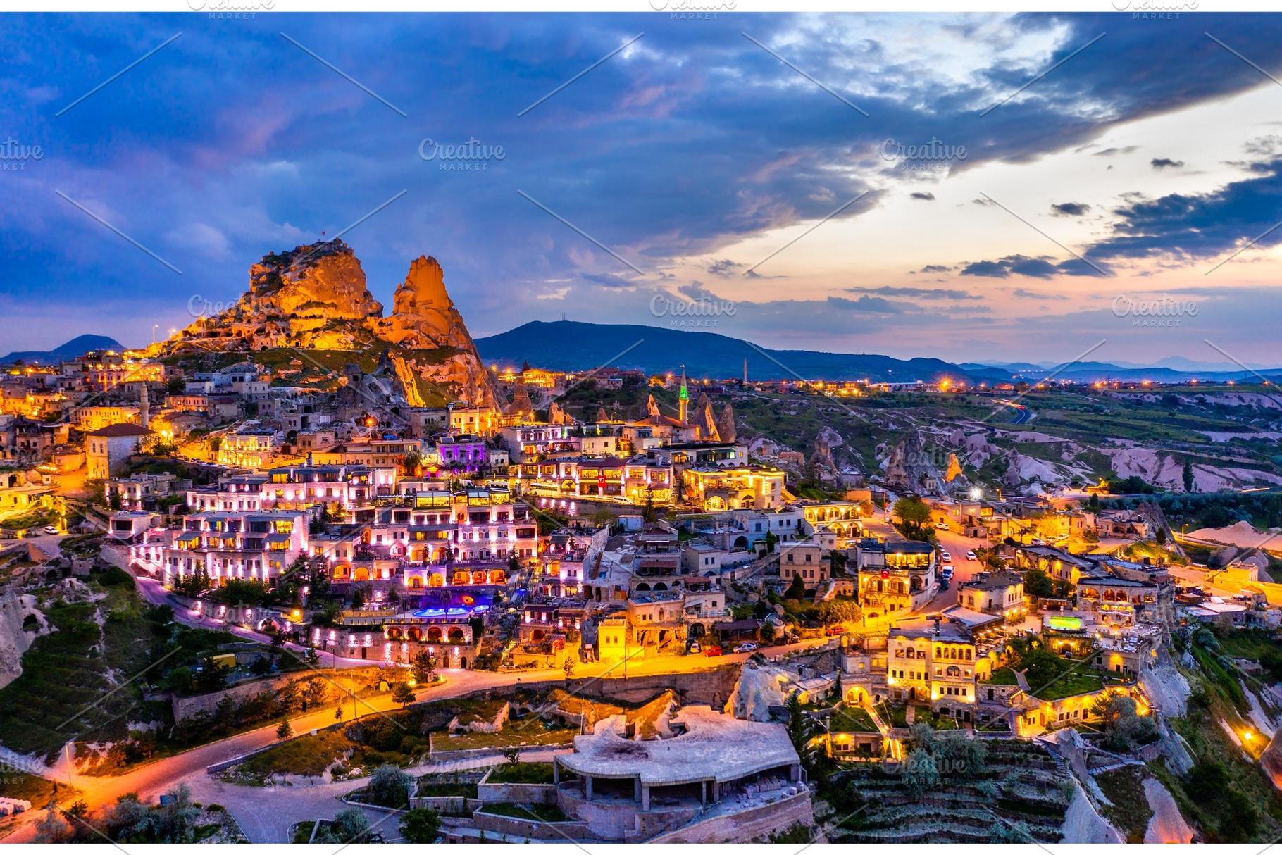 View of uchisar at sunset stock photo containing cappadocia and turkey, an Architecture Photo by Leonid Andronov