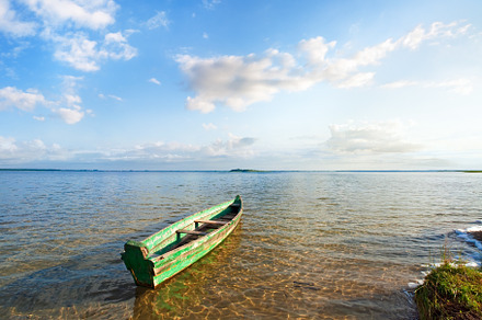 Old wooden fishing boat on summer lake bank (Svityaz, Ukraine), a Nature Photo by YuriyB
