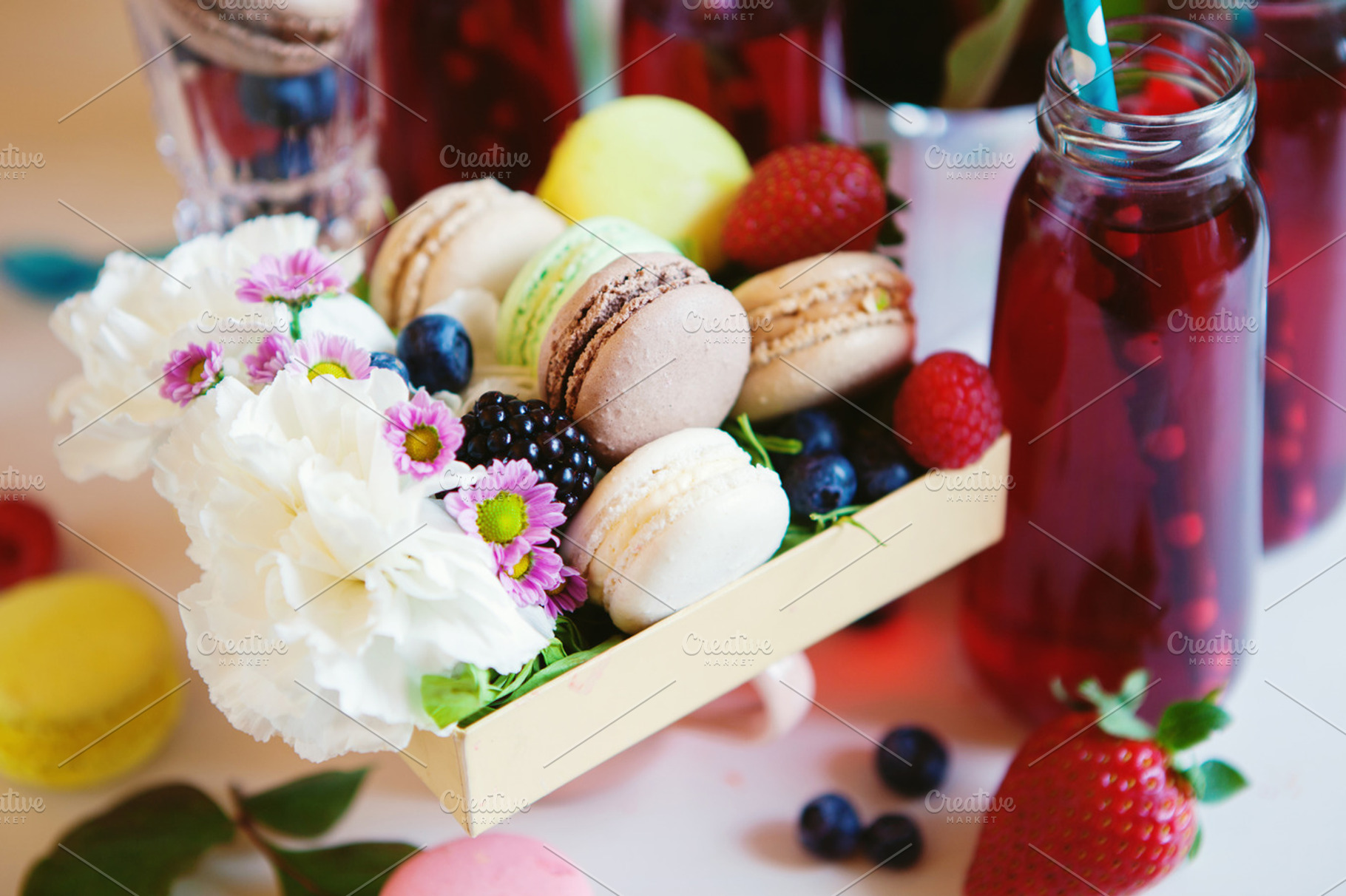 Macarons and flowers stock photo containing macarons and macaroon, a Food & Drink Photo by marikasan
