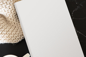 Mockup of a book with surrounding objects