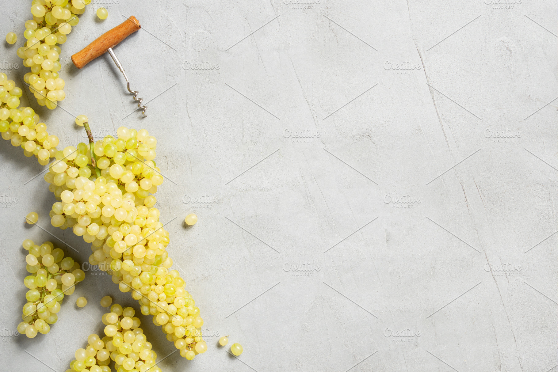 Bunches of grapes and corkscrew, a Food & Drink Photo by AlinaKho
