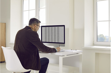 Business accountant or auditor, a Business Photo by StudioRomantic