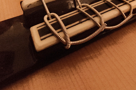 Close-up, high-angle detail shot of a classic spanish guitar, an Arts & Entertainment Photo by DanFLCreativo