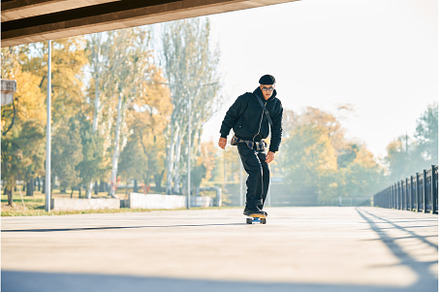 Skateboarder skateboarding on the, a Person Photo by Gladkov photography