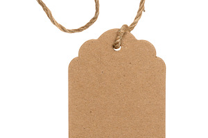 A blank kraft paper tag with rounded and shaped edges, suspended, a Business Photo by ndanko