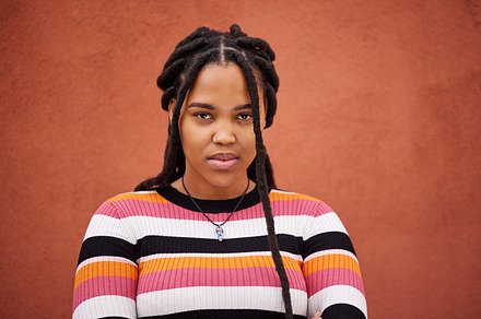Portrait, wall and black woman with frustration, anger and upset on brown studio background. Face, African American female and lady angry, stress and depression with frustrated facial expression, a Photo by Peopleimages.com
