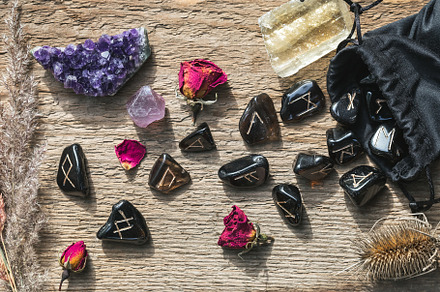Set of different crystals and runes, an Arts & Entertainment Photo by Andriana Syvanych