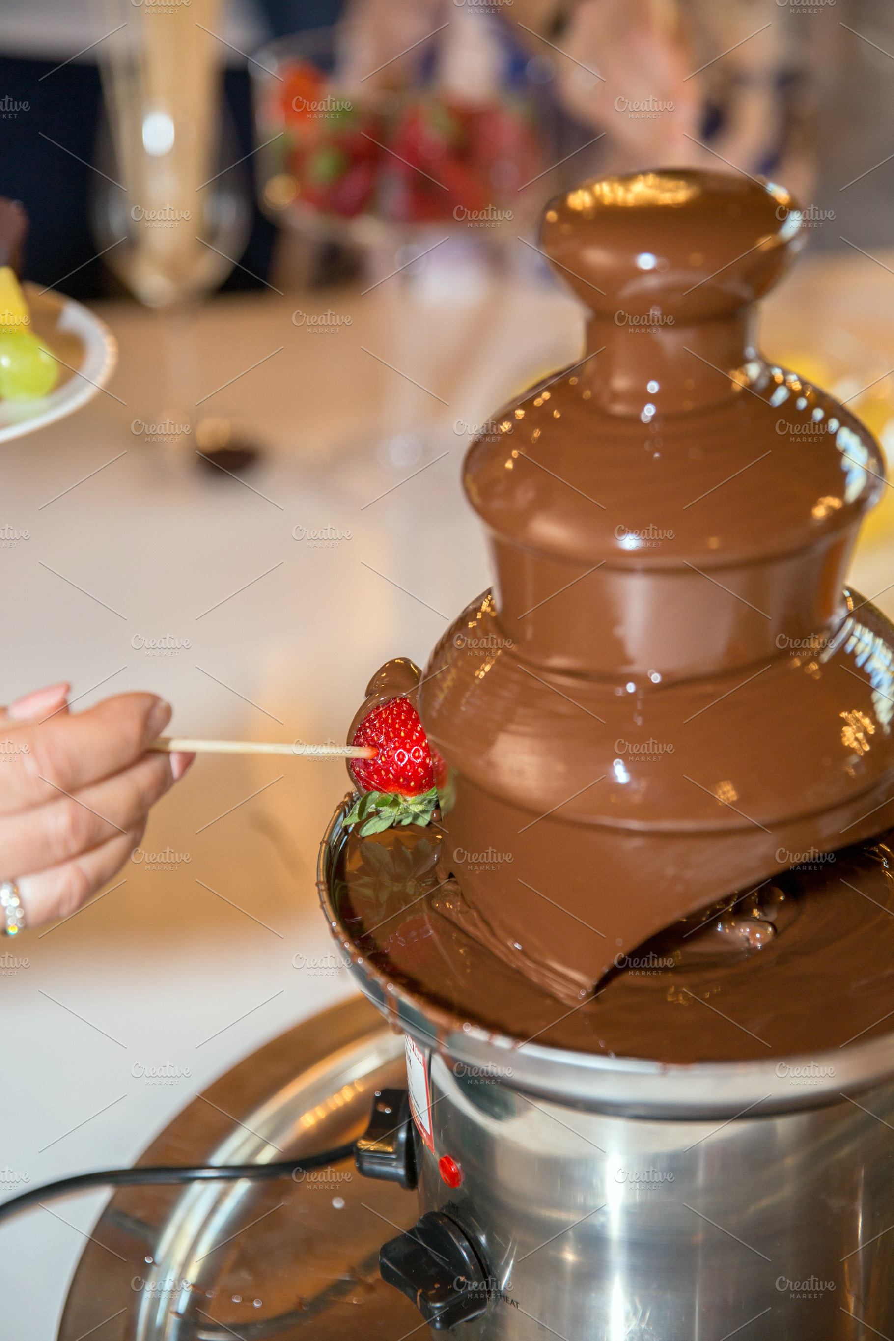 Vibrant chocolate fountain, a Food & Drink Photo by KYNA STUDIO