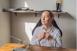 Woman working in her home office, a Technology Photo by Elizaveta Galitskaya