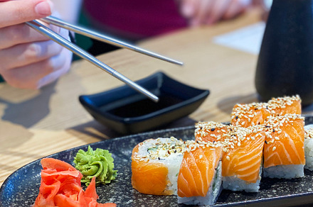Eating roll sushi, a Food & Drink Photo by Olena Rudo