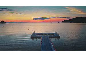 Floating dock extending into, a Nature Photo by Goinyk