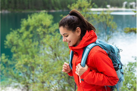 Close up portrait of a woman hiking, a Sports & Recreation Photo by AD Stock Images