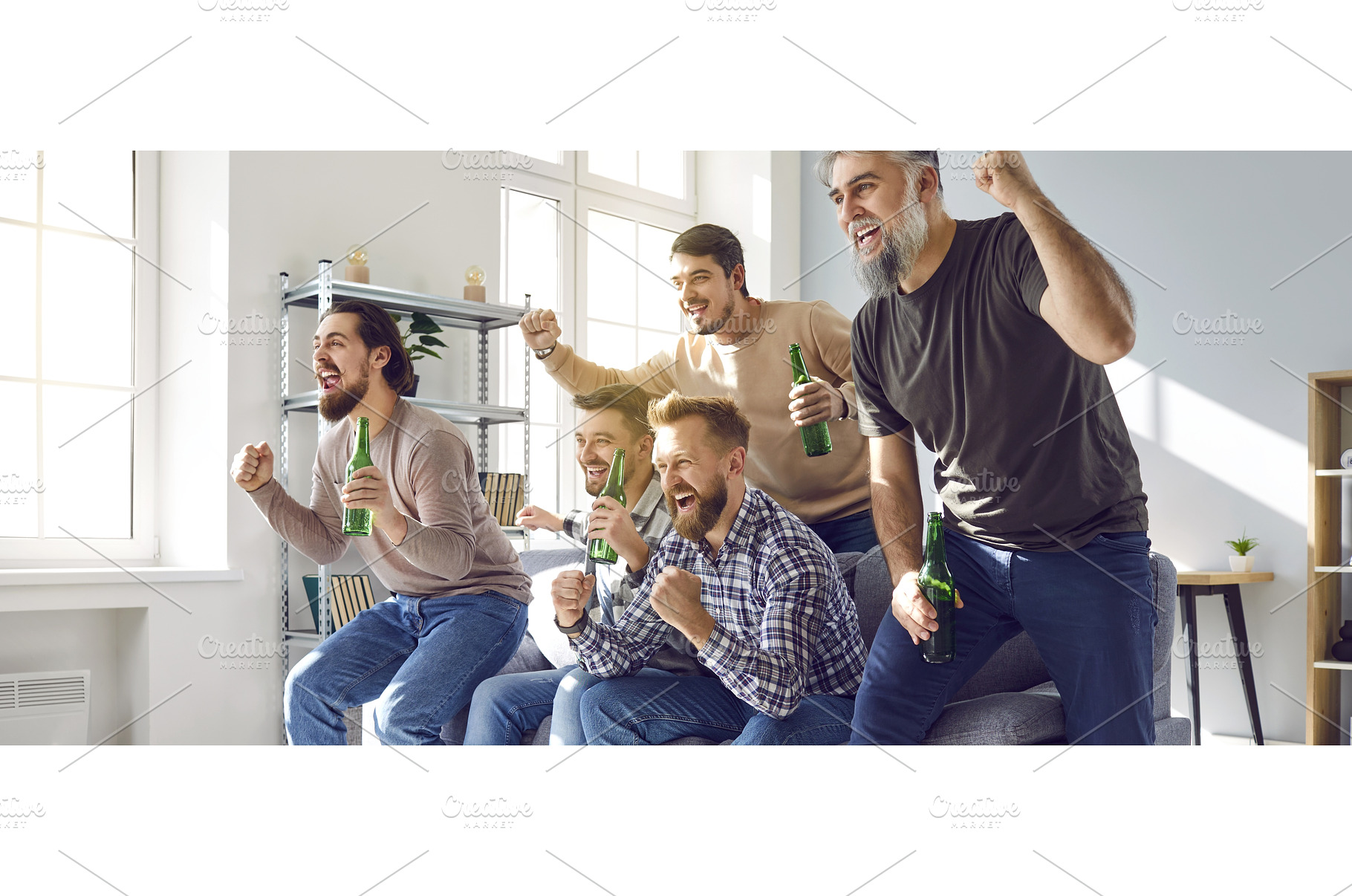 Male football fans watching soccer, a Person Photo by StudioRomantic