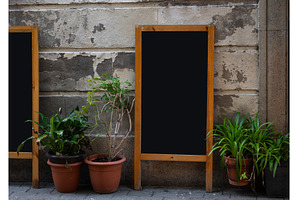 Blank restaurant menu board on old, a Background Photo by volodymyrshtun13795