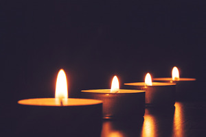 Candles featuring candles, fire, and light