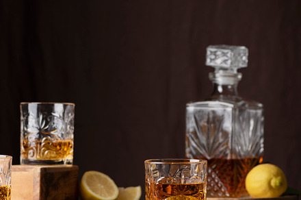 Glasses of rum with ice and lemon, a Food & Drink Photo by oxana.denezhkina