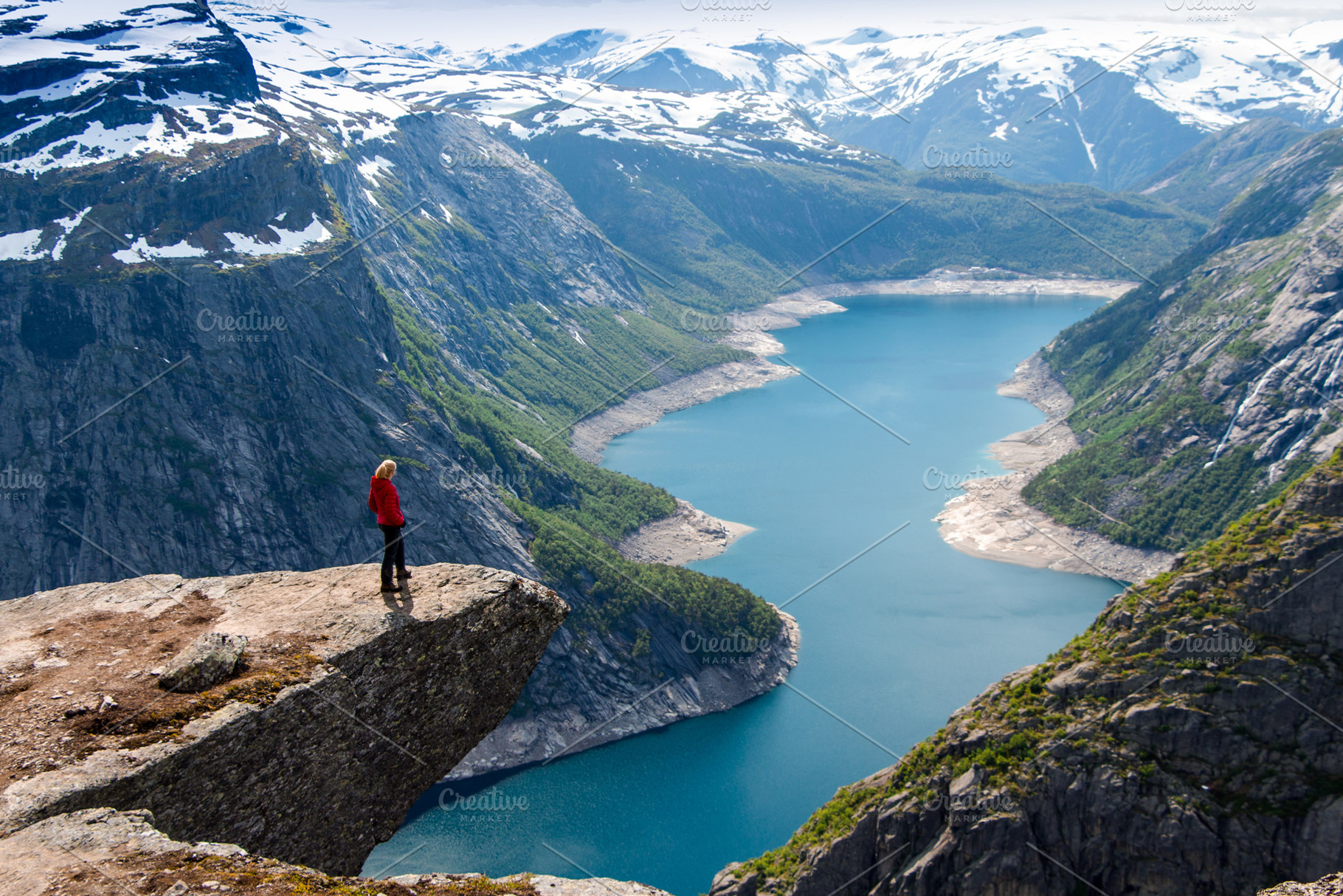 Traveler woman standing on a cliff stock photo containing hill and outdoor, a Nature Photo by Travel_photos