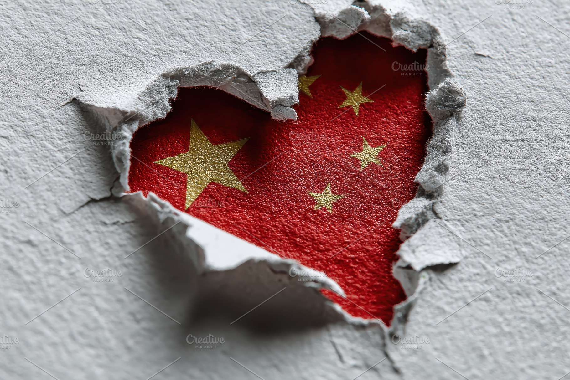Chinese flag heart shape breaking th, a Photo by Pixeness Studio