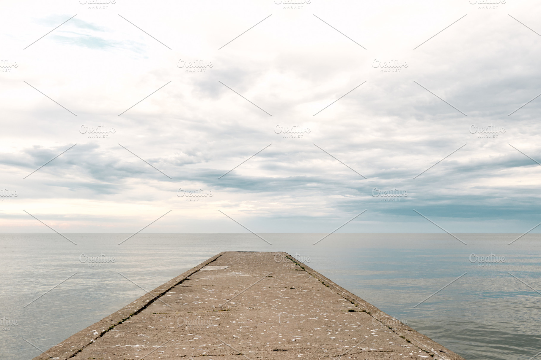 Empty concrete pier to the sea, a Nature Photo by BOOCYS