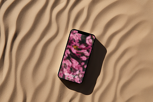 IPhone On Wavy Sand