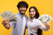 Big luck and win concept. Excited young indian couple holding dollar cash, posi, a Photo by Prostock-Studio (Thumbnail 2 of 4)