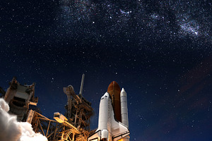 Space shuttle containing space, cosmos, and shuttle