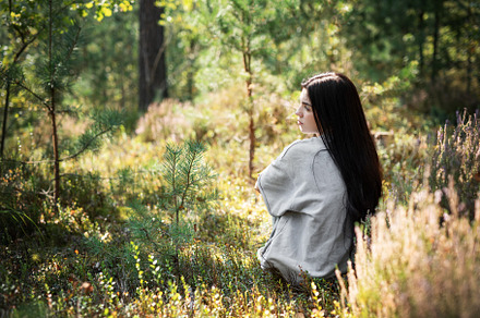 A tranquil moment of reflection in a serene forest setting durin, a Person Photo by Olena Rudo
