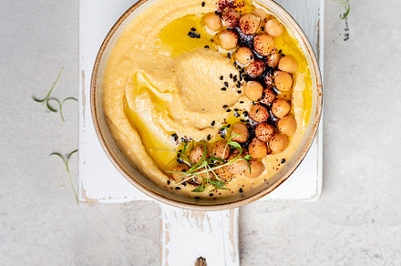 Traditional homemade chickpea hummus, a Food & Drink Photo by Marina_Pronina
