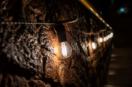 Dark background with retro-bulbs