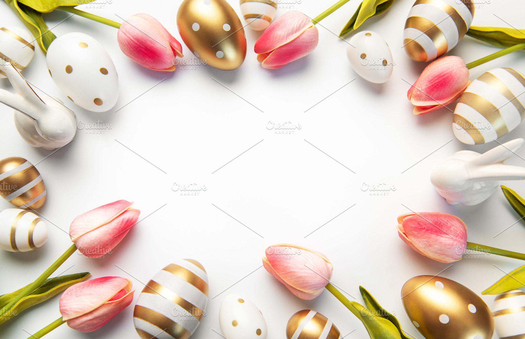 Easter eggs tulips and bunnies creating festive border, a Holiday Photo by Olena Rudo