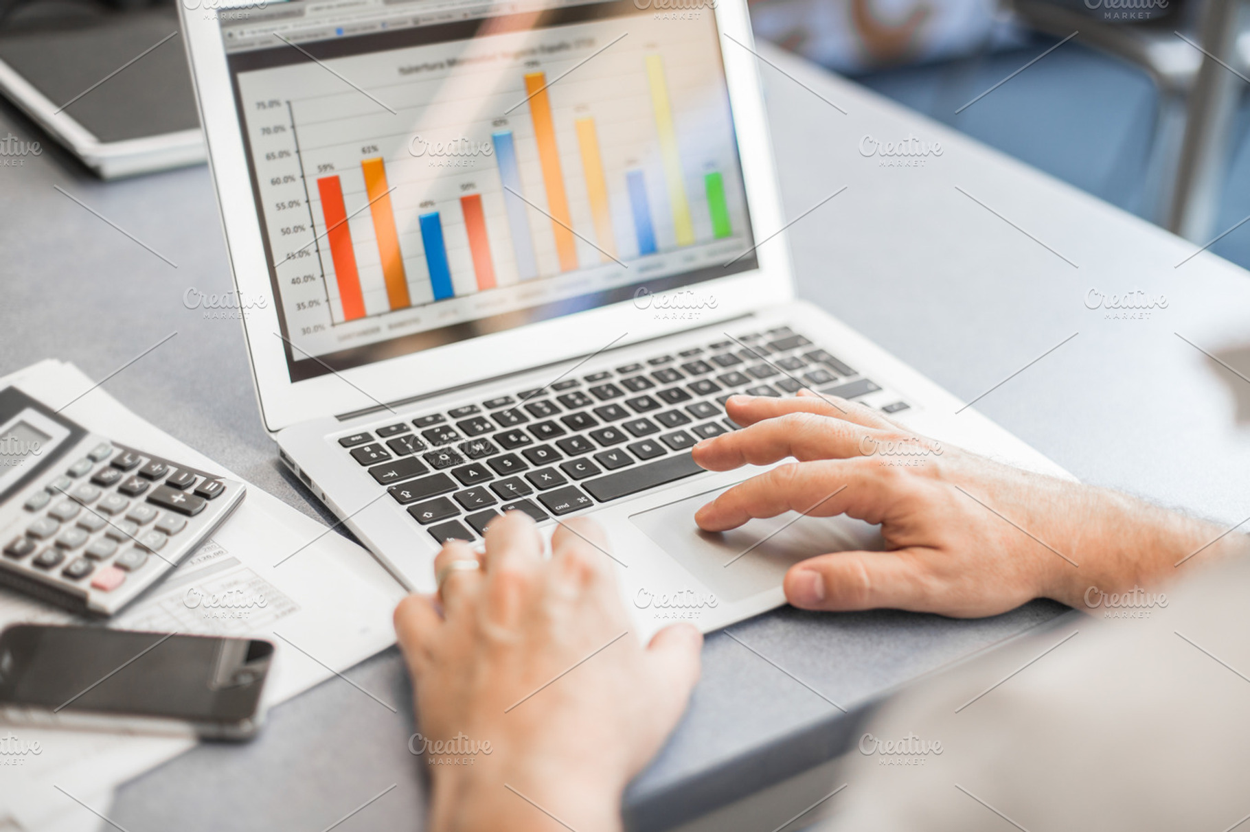 Businessman working containing bargraph, business, and businessman, a Business Photo by Kowostock