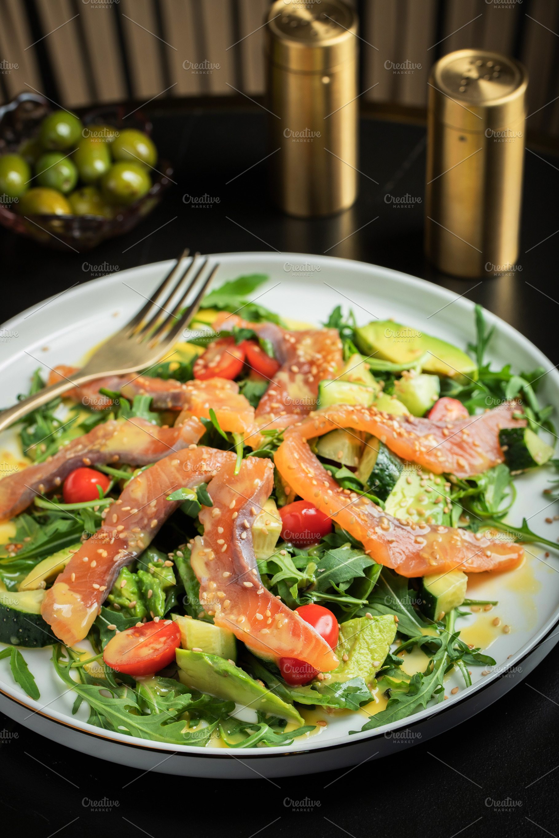 Salad with salted salmon and arugula, a Food & Drink Photo by Budarinphoto