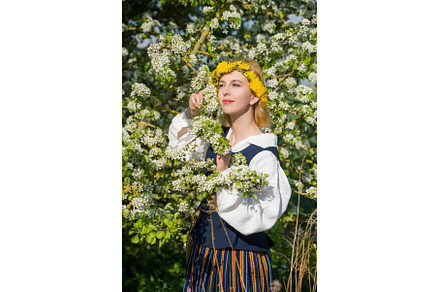 Beautiful woman in national dress, a Holiday Photo by COLORFUL