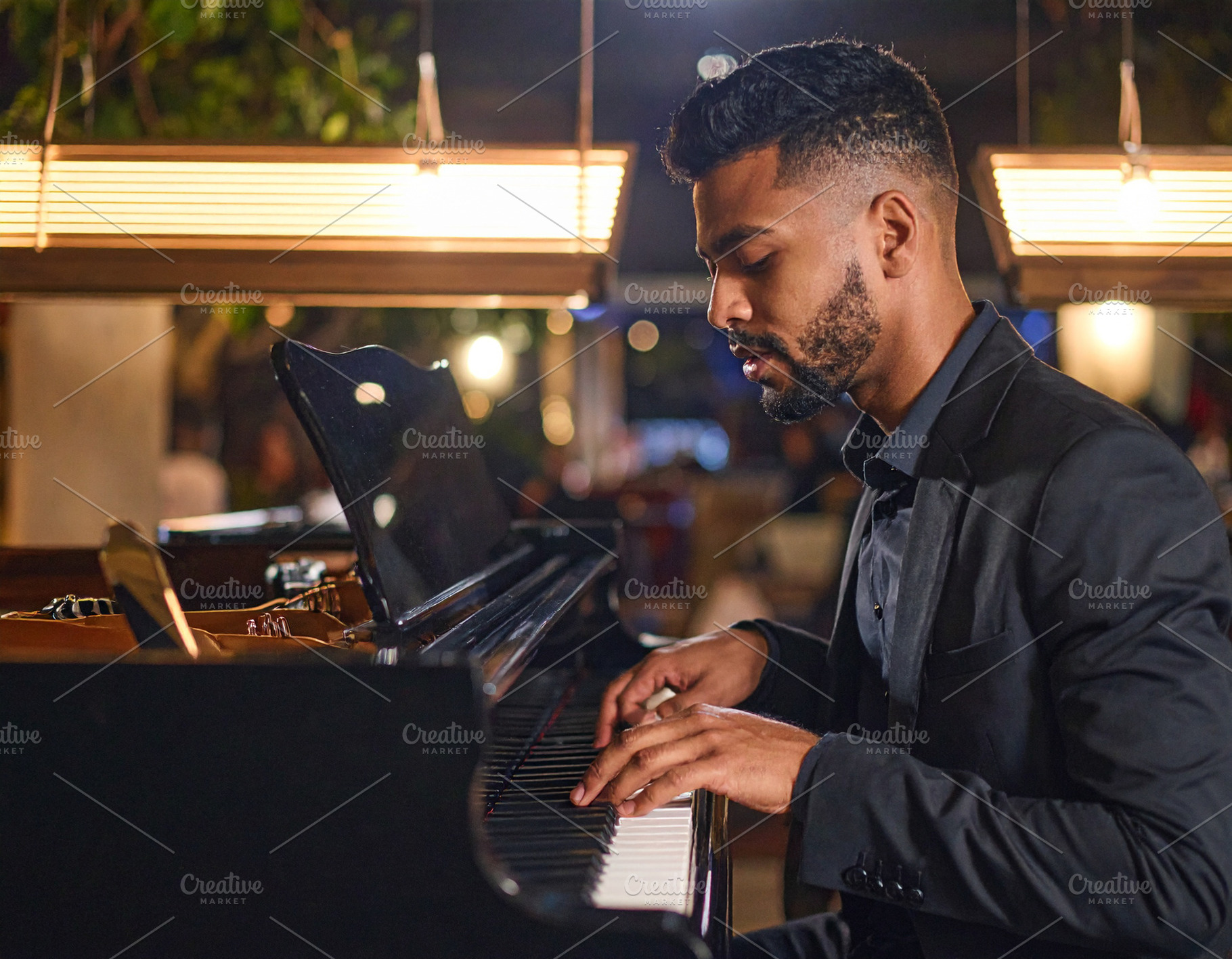 Adult pianist performing at the piano in a small bar, a Person Photo by DanFLCreativo