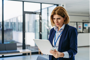 Portrait of female medical sales, a Business Photo by HalfPoint