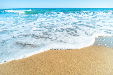 Tropical beach with sand and sea stock photo containing beach and sand, a Nature Photo by Vapi
