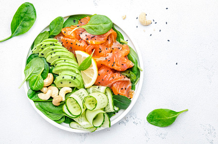 Salmon salad for ketogenic diet with avocado, spinach, cucumber,, a Food & Drink Photo by 5PH