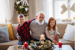 Kids spending Christmas time with, a Person Photo by HalfPoint
