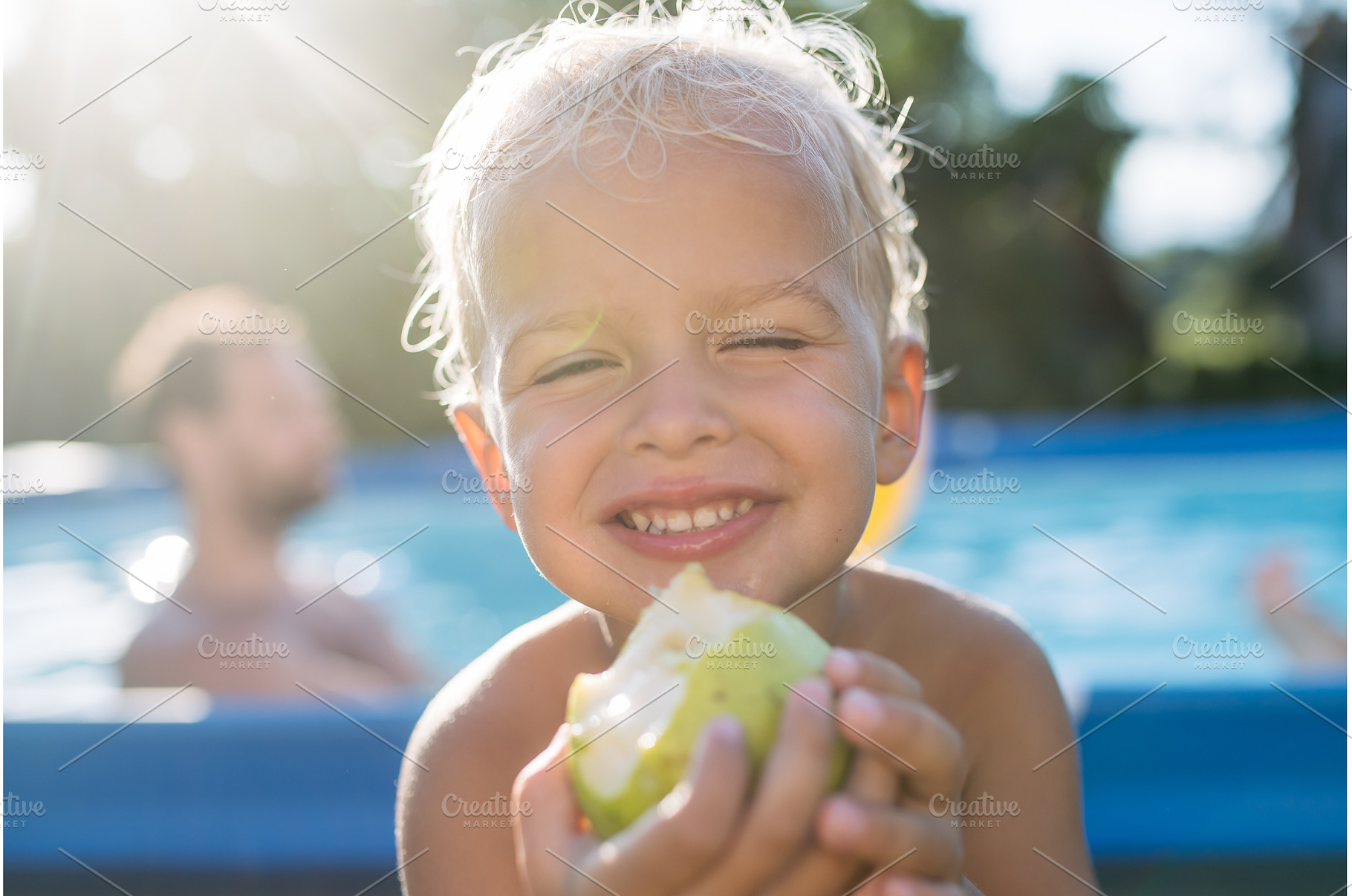 Little boy eating fresh apple, a Nature Photo by HalfPoint