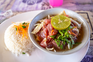 Polynesian raw fish dish served in Hiva Oa, French Polynesia, a Food & Drink Photo by GoodGoods